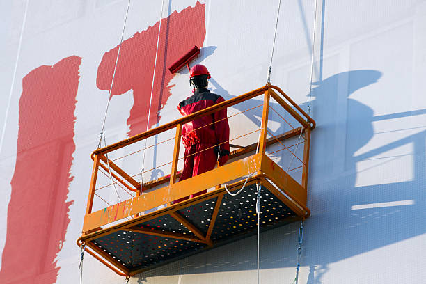 Trabajos de pintado industrial en altura sobre fachada